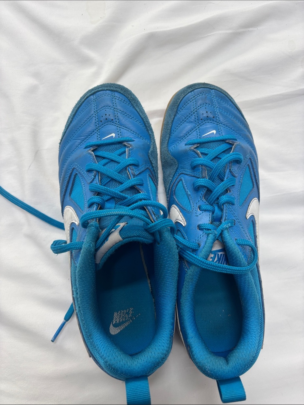 Nike Teal-Blue Athletic Sneakers with White Swoosh.   Used for indoor soccer